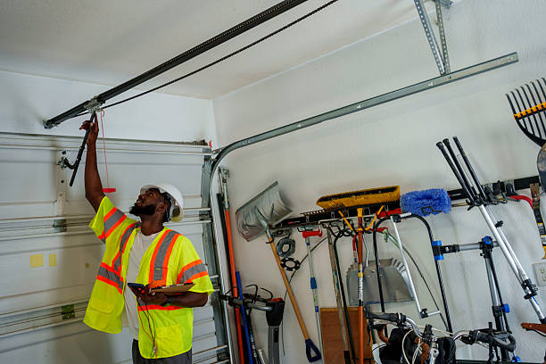 Professional Garage Door Roller Replacement technician working in Babbitt, MN